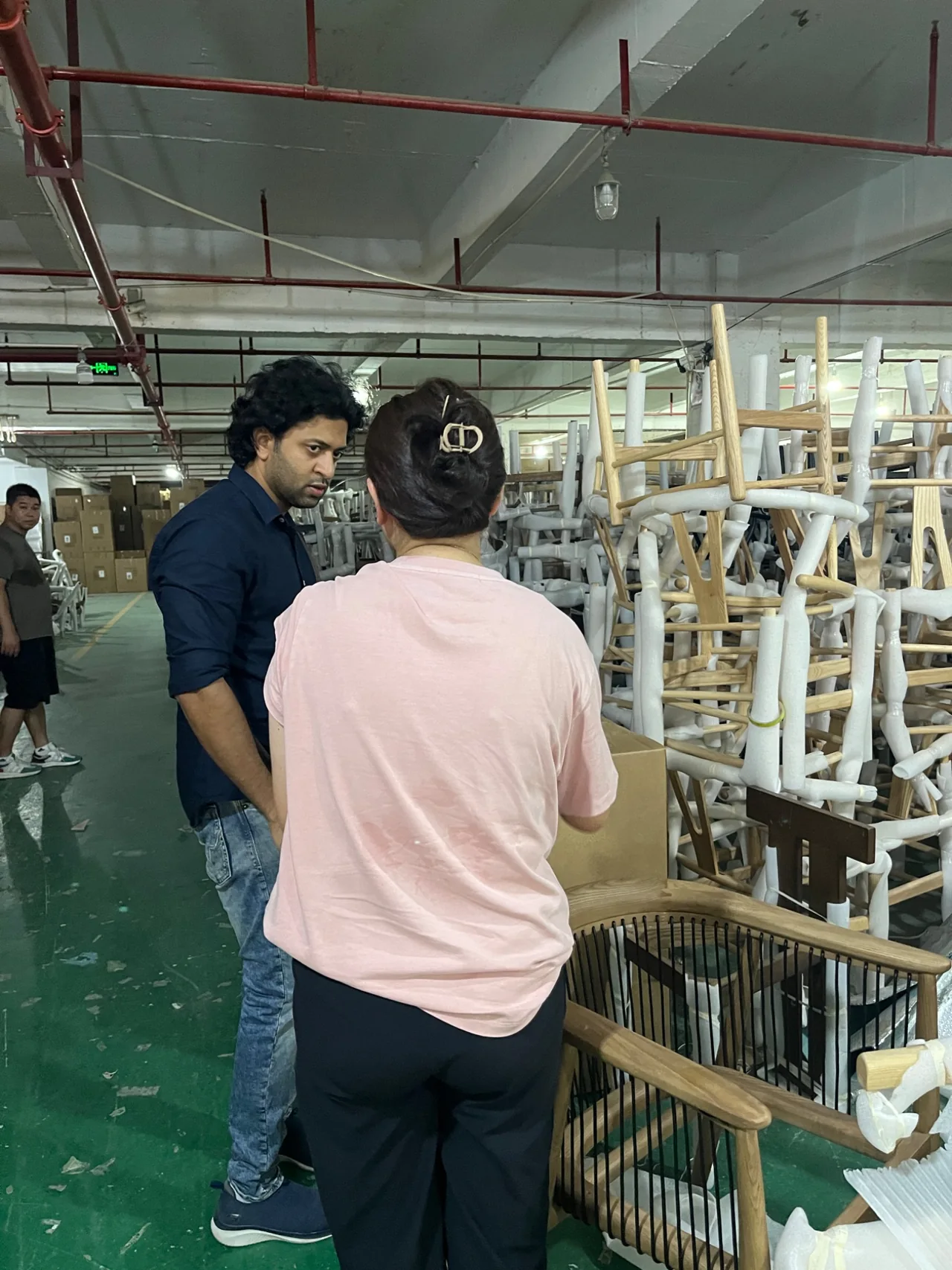 Visitors touring a production workshop